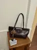 Comércio exterior transfronteiriço estilo coreano bolsas de nicho femininas nova bolsa de ombro alta super quente retrô elegante para o dia a dia