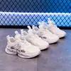 Zapatillas infantiles 2025 otoño nuevo botón giratorio zapatos blancos cómodos versátiles estudiante casual zapatillas para correr