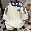 Camiseta de Algodón 100% Puro Estilo Minimalista Verano Más Vendida Cuello Redondo Raya Triple Manga Corta Unisex Corte Holgado Adelgazante Top de Pareja