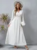 Website independente comércio exterior estilo novo europeu e americano vestido floral de gola V manga longa com cintura marcada e saia rodada, estampado, moderno e versátil