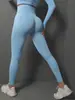 Nuevos pantalones de yoga de cintura alta transfronterizos para mujer, pantalones deportivos ajustados de secado rápido color durazno, pantalones de fitness sin costuras que levantan el trasero, pantalones de yoga