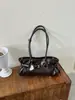 Bolso de hombro de moda de alta gama transfronterizo para mujer, nuevo bolso de axila de nicho para el día a día, bolso de mano elegante y versátil para salidas