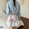Bolsas Estampadas de Nicho Súper Populares para Mujer 2026 Nueva Moda Bolso Cruzado Versátil Bolso de Mano Casual Exquisito Bolso de Cubo
