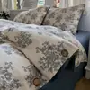 Juego de cuatro piezas de estilo vintage de lujo ligero de algodón lavado de lino ultrasuave con funda de edredón abotonada, sábana plana, sábana bajera y artículos de ropa de cama 4