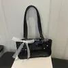 Bolsa de Axila Lisa de Color Nuevo Otoño 2026 Bolso de Mano Dulce Fresco Moda Simple Nicho Bolso de Hombro de Gran Capacidad