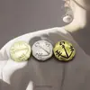 Directo de fábrica de alta gama retro metal irregular botón redondo suéter abrigo traje chaqueta todo partido lote de botones