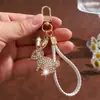 Exquisita y lujosa llavero de conejo de diamantes de imitación para coche para mujeres, moderno y lindo, llavero colgante creativo para bolso, regalo