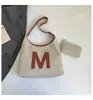 Bolsa Tote de Luxo Transfronteiriça 2026 Nova Coleção Primavera Vintage Grande Capacidade Moda Versátil Nicho Bolsa de Ombro de Mão