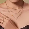 Conjunto de Joyería Versátil de Acero Inoxidable con Flor de Cuatro Hojas y Circonita, Aretes, Anillo, Chapado en Oro de 18K, Moda Europea y Americana