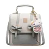 Mochila de Estilo Universitario Patchwork de Colores Bloqueados Estilo Coreano para Mujer 2026 Nueva Tendencia Bolso de Mano Mochila con Lazo