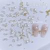 Celebridad Cibernética Joyería para Uñas Textura de Taladro Alienígena Fondo Plano Perla Blanca Pura Diamante de Amor Ovalado tamaño pequeño Decoración de Uñas Taladro