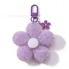 Venta Directa de Fábrica Llavero de Flor de Peluche Accesorios de Pompón de Color Caramelo Colgante de Niña Flor de Cerezo de Invierno Flor Pequeña Linda
