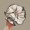 Goma para el pelo de lunares florales de hada atmosférica para mujer, estilo coreano, nicho, cuerda para el pelo, flor de pelo elegante