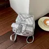 Mochila Pequena Corrente Acolchoada com Diamantes Estilo Chanel para Mulheres 2026 Nova Bolsa de Mão Versátil Casual de Nicho de Alta Qualidade Mochila Pequena