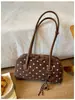 Bolsa de almofada de bolinhas de alta qualidade e estilosa para mulheres, nova bolsa de boliche retrô de nicho, bolsa de ombro sob o braço, moderna
