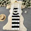 Vestido de punto con tirantes a rayas Crochet calado Chaqueta protectora solar Yujie Temperamento ligero Traje de socialité Femenino Verano