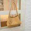 Bolsa de mão transfronteiriça com padrão trançado personalizado para mulheres, novo modelo 2026, textura de alta qualidade, estilo de nicho, bolsa versátil de ombro e debaixo do braço