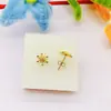 Pendientes de girasol chapados en oro de temperamento para mujer, moda, estrellas frescas, nicho, joyería para orejas de alta gama, fabricantes de origen, venta al por mayor