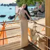 Traje Estilo Vacaciones en la Playa para Mujer 2026 Nuevo Estilo Conjunto de Dos Piezas con Top de Tubo Falda Larga a Cuadros de Cintura Alta que se Ajusta a la Cadera