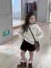 Suéter de punto con capas huecas, suelto y elegante, estilo coreano para niñas Aimobeibei, cárdigan de punto casual, suave y de alta calidad para niños