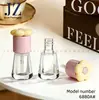 Servicio de Pedidos Jinze: Tapas en Forma de Flor, Botellas Trapezoidales, Tubos para Brillo de Labios, Materiales de Empaque de Tubo Vacío de Plástico