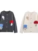 Venta al por mayor transfronteriza Verano 2025 Nuevo estilo europeo y americano para mujer Cardigan de punto con botones estilo falda corta