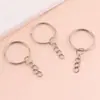 En stock: 25/30 llaves anillo plano cadena de cuatro secciones anillo único juguete muñeca llavero colgante accesorios