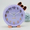Reloj al por mayor directo de fábrica despertador redondo creativo con lazo regalo festivo de vacaciones regalos para empresas de exportación