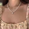 Duas peças Pearl Colar Luz Luxo Nicho Suave Estilo Retrô Nova Clavícula Cadeia Feminina Internet Celebridade Acessórios Design Sense