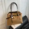 Bolso Tote de Moda Retro Estilo Coreano para Mujer 2025 Otoño e Invierno Nuevo Elegante y Exquisito Bolso de Hombro Bolso Simple de Axila