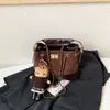 Bolso pequeño de cadena acolchado estilo Chanel con patrón de rombos, un bolso de axila vintage versátil y único, un bolso de mano delicado que se puede llevar en la mano o cruzar sobre el cuerpo