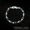 Gvc Ji Jia Pulseira de Gota Bicolor de Alta Qualidade para Mulheres, Joia Versátil da Moda de Luxo Leve com Elemento de Cristal Atacado do Fabricante