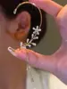 Estilo Douyin Mismo Estilo Mariposa Flor Colgante de Oreja Sin Agujeros en las Orejas Pinza para Oreja Mujer Lujo Ligero Elegante Versátil Espiga Borla Pendientes