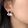 Pendientes de plata de ley S925 estilo coreano de lunares con lazo 2026 nuevos de moda populares versátiles de alta gama hermosos pendientes para mujer