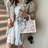Bolsa Sense de Alta Qualidade Pequena Crowdsourcing Feminina 2025 Outono e Inverno Nova Moda Bolsa de Ombro Feminina Moda Ins Versátil Bolsa de Mão