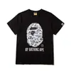 Comercio exterior al por mayor transfronterizo marca de tendencia estilo japonés camuflaje tiburón, cabeza de tigre, hombre-mono bloques de color luminoso manga corta corte holgado camiseta de pareja