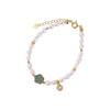 Pulsera elegante de plata de ley S925 con diseño de flor de perla de jade bañada en oro y diseño de ciervo, estilo chino.
