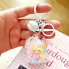 Sonho de Nuvem Sino Pequeno Chaveiro Criativo Acrílico Areia Líquida Preenchido com Óleo Boneca Pingente Criativo Pequeno Presente Fofo para Meninas