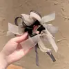 Diadema de pelo de malla rosa con lazo, diseño de nicho de Dongdaemun, Corea, banda elástica para el pelo para mujer, accesorio de pelo simple y versátil