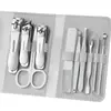 Kit de aço inoxidável para arte de unhas transfronteiriço com 10 peças: lixa de unha, tesoura de sobrancelha, limpador de ouvido, pinça para sulco da unha, cortador de unha do pé