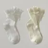 Calcetines para niños para otoño e invierno con bordes rizados y lazos, adecuados para niñas y bebés, estilo Lolita, calcetines de media pantorrilla sin presión