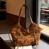 2025 Nuevo Bolso Cubo de Moda Senmeng Estilo Casual Perezoso Bolso de Hombro Único Versión Coreana Estampado de Leopardo Bolso Retro de Axila