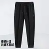 Pantalones de otoño gruesos para hombre con elasticidad en cuatro direcciones, cremallera, múltiples bolsillos, cintura elástica, corte recto holgado, estilo jogger