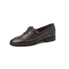 Zapatos de Cuero Negro Estilo Neutro Atractivo Otoño 2026 Nuevos Zapatos de Cuero para Uniforme con Remaches Estilo Academia Correa Cruzada Cuero Genuino