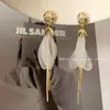 Pendientes de Borla de Pétalos Blancos Largos de Gama Alta Super Hada, Pendientes de Gama Alta Nuevos de Moda de Lujo Ligero Nicho para Adelgazar la Cara