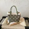 Bolso tipo cubo casual estilo coreano, nuevo bolso de mano otoño e invierno 2026, bolso de hombro y cruzado de moda con lunares único
