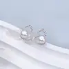 Aretes de Perlas de Agua Dulce Naturales Reina de Hielo y Nieve Aguja de Plata S925 Corona Pendientes de Gama Alta Elegantes Estilo Nuevo
