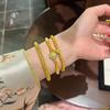 Tienda de Oro Jin Yan Mismo Estilo Arena Dorada Perla Azul Hielo Cuatro Ruyi Cuentas de Transferencia Doble Capa Pulsera de Lujo Ligero para Regalo de Novia