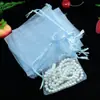 Bolsa de malla bolsa de hilo boca de cordón bolsa de regalo bolsa de tela de organza transparente lisa bolsa de almacenamiento de joyas bolsa pequeña al por mayor en stock