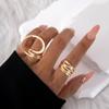 Joyería Yongge Juego de Anillos Irregulares Huecos en Forma de Arco Estilo Europeo y Americano de Cuatro Piezas con un Anillo de Superficie Lisa Abierta Inspirado en el Diseño